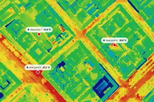 Thermal map of a city district in the MapperTool viewer, with three heat points reading surface temperature